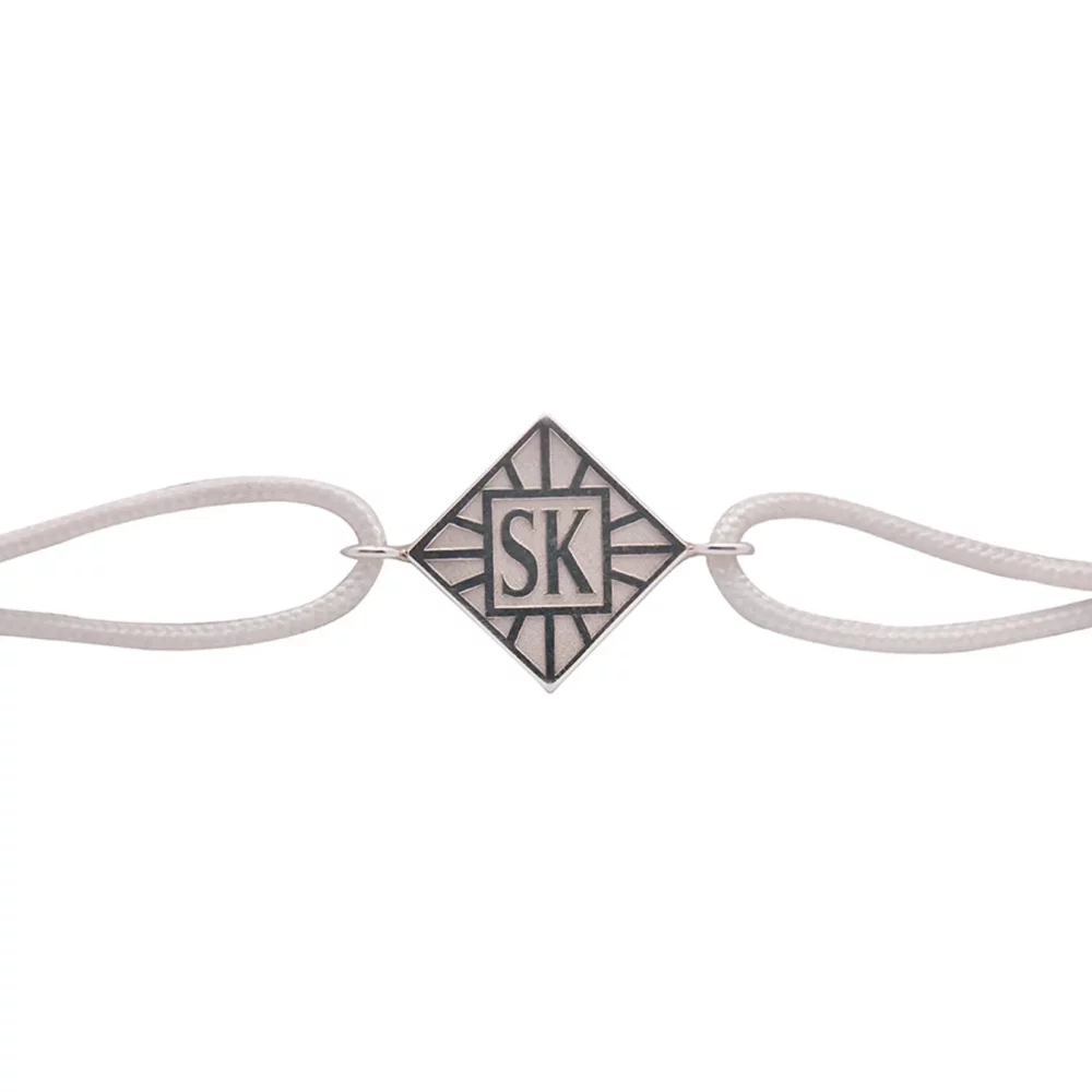 Bracelet en argent joaillerie bordeaux cordon blanc résine huître